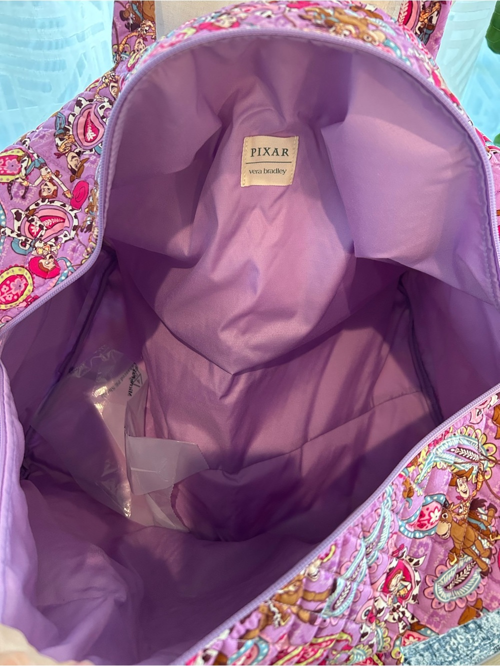 NWT Disney Pixar Toy Story Rodeo Paisley Purple Large Duffel Bag - Picture 9 of 10